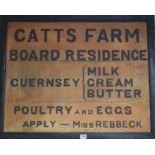 A Catts Farm double sided sign