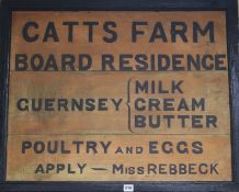 A Catts Farm double sided sign