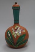 An 19th century Commondale Pottery, Stokesley, terracotta water bottle and cover, painted with