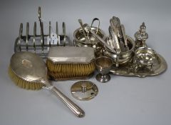 A silver-mounted manicure set, a part dressing table set and sundry plated items
