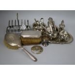 A silver-mounted manicure set, a part dressing table set and sundry plated items