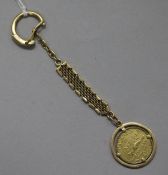 A Caciques de Venezuala Guaicaipuro 1957 gold coin, mounted on an 18ct gold key ring, gross 15.5