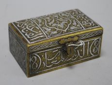 A Cairo ware silver inlaid brass box