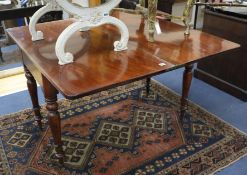 A Victorian mahogany breakfast table with swivel folding top, W.122cm