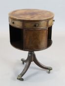 A Regency style banded mahogany drum top book table, H.76cm