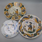 A Faience plate and two figurative dishes