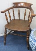 A Victorian elm and beech captains chair,