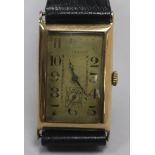 An Art Deco gentleman's 9ct gold wristwatch with silvered Arabic dial