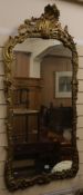 An 18th style gilt painted carved wood and gesso mirror, a.f, H.136cm