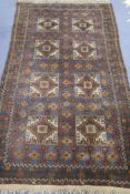 A Persian blue ground rug, 190cm x 110cm