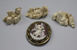 Three Japanese ivory okimonos, c.1900 and a shell cameo brooch