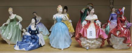 A collection of nine Royal Doulton figures, including 'Lady Charmien', HN 1949, 'Lilac Time', HN
