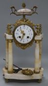 A French rough marble four pillar clock