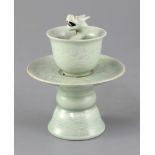 A 19th century Chinese celadon cup and stand