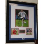 A signed Wayne Rooney photographCOA from Rye by Post, presentation framed.