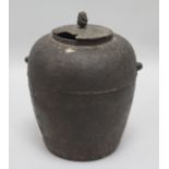 A Japanese lidded metal pot