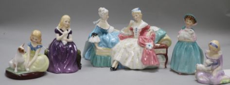 A Royal Doulton figure group, 'The Love Letter', 'HN 2149 and four Royal Doulton small figurines,