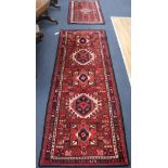 A red ground runner and prayer mat Runner 189cm x 73 cm, mat 97 x 64cm