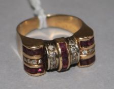 A 1940's gold, ruby and diamond set cocktail ring, size P.