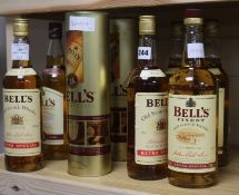 Eight bottles of Bells 8 year old whisky (3 in box), two Bells Extra Special whisky, and one litre