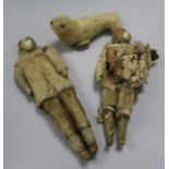 Two Inuit walrus ivory and hide figures of Eskimos, late 19th century, together with a figure of a