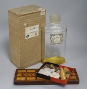 A Coty perfume bottle, mixed mother of pearl sewing items etc., and a cribbage board
