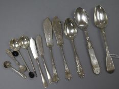 Eleven small items of assorted silver cutlery.