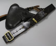 A German holster and a Sam Brown belt