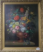 English Schooloil on wooden panelStill life of flowers in a vase upon a ledge62 x 49cm