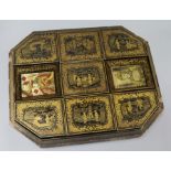 A 19th century Chinese export lacquer games box, containing engraved mother of pearl counters