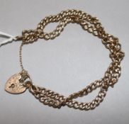 A 9ct gold curb link bracelet 15.6 grams.