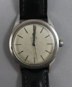 A gentleman's 1950's stainless steel Omega automatic wrist watch.