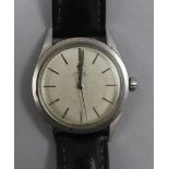 A gentleman's 1950's stainless steel Omega automatic wrist watch.