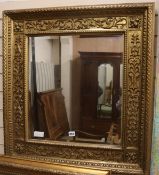 A gilt framed mirror, H.83cm