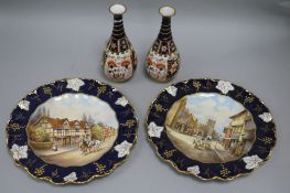 A pair of Royal Crown Derby cabinet plates and a pair of Royal Crown Derby Imari vases, the plates