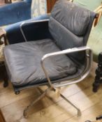 A leather and chrome frame swivel desk chair