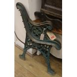 A pair of cast iron bench ends, H.70cm