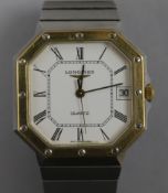 A gentleman's gold plated and steel Longines Quartz octagonal cased wrist watch.