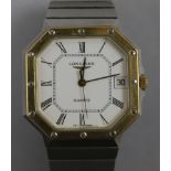 A gentleman's gold plated and steel Longines Quartz octagonal cased wrist watch.