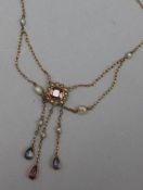 A late Victorian gold, baroque pearl and gem set drop necklace, 48cm.