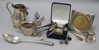 Two silver cream jugs, a cased pair of silver napkin rings and other items including flatware and