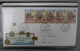 A collection of mint GB stamps and First Day Covers