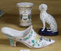 A tinglaze famille verte model of a shoe, a Staffordshire dalmatian and an English porcelain spill