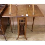 An Edwardian mahogany sutherland table,
