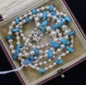 A cultured pearl and turquoise necklace with rose cut diamond set 9ct white gold clasp, 64cm.