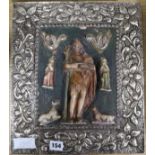 A Spanish polychrome painted silver framed plaque of San Juan Bautista