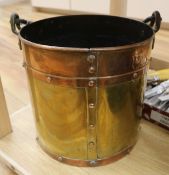 A copper and brass bucket