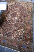 A Persian Borchalo rug, 7ft 4in. x 4ft 11in.