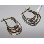 A pair of 9ct gold and diamond multi-hoop earrings (faults),
