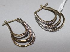 A pair of 9ct gold and diamond multi-hoop earrings (faults),